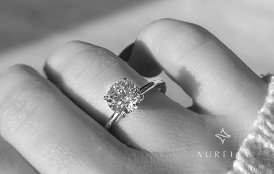 diamond ring showing on a model's hand