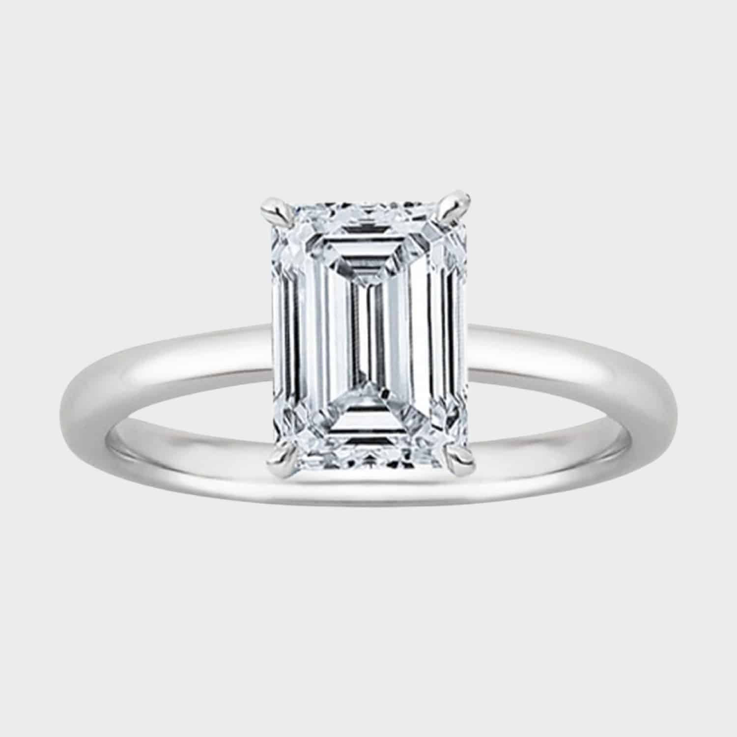 Explore the IGI-certified 1-carat emerald-cut diamond engagement ring in 14K white gold, a stunning option in engagement rings below 1000. Explore the IGI-certified 1-carat emerald-cut diamond engagement ring in 14K white gold, a stunning option in engagement rings below 1000.