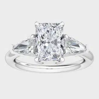 Shop 1 carat lab-grown radiant shield-cut three-stone engagement rings below $1000. D-E color, VS1-VS2 clarity, crafted in 14k white gold.