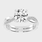 Shop 1 carat twisted-style solitaire lab-grown diamond engagement rings below $1000 in 14k white gold or platinum. F-G color, VS1-VS2 clarity.