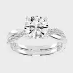 Shop 1 carat twisted-style solitaire lab-grown diamond engagement rings below $1000 in 14k white gold or platinum. F-G color, VS1-VS2 clarity.