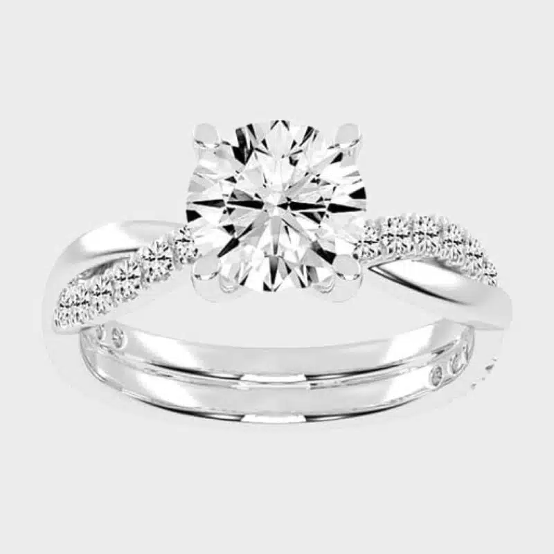 Shop 1 carat twisted-style solitaire lab-grown diamond engagement rings below $1000 in 14k white gold or platinum. F-G color, VS1-VS2 clarity.