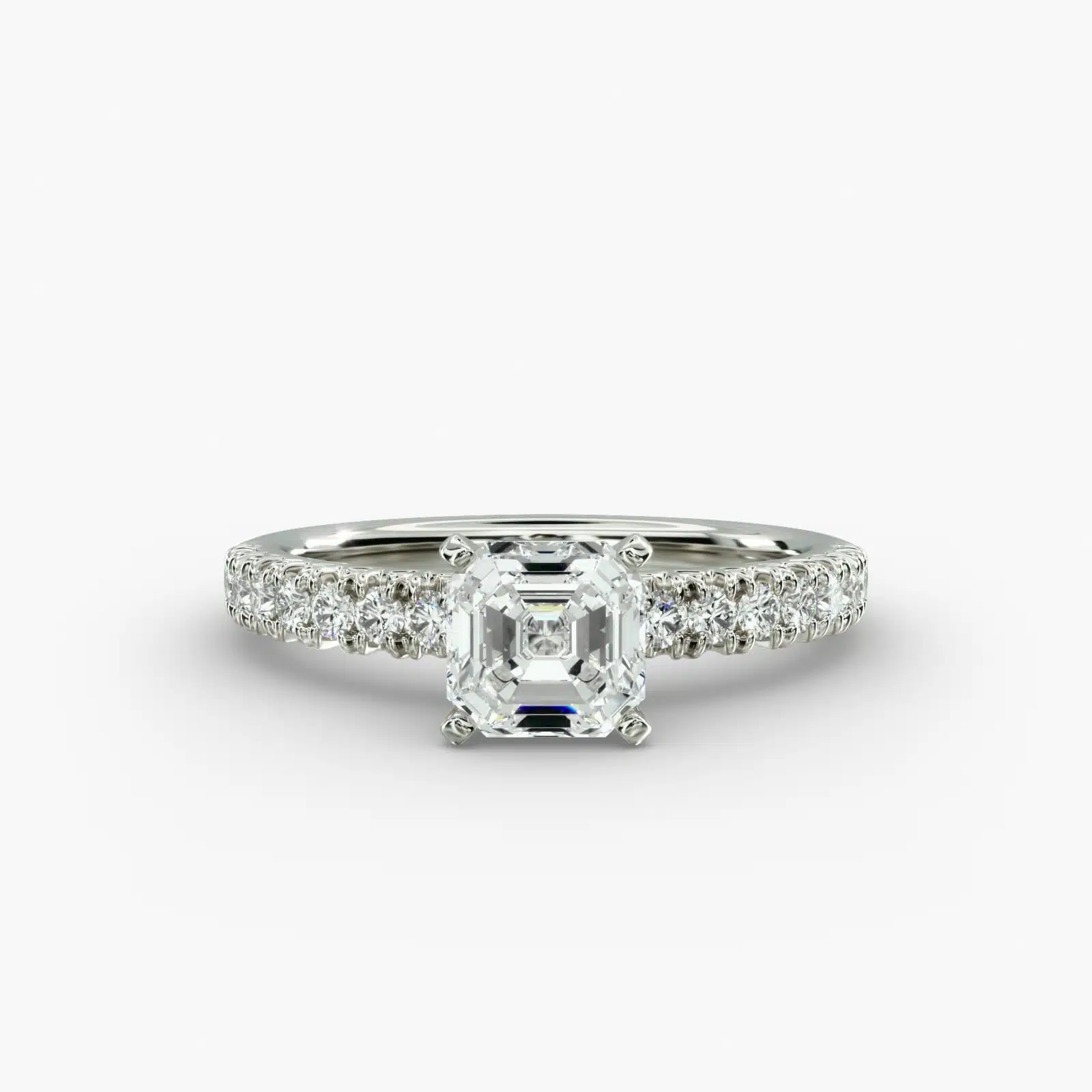 asscher kite with prongs on sides 1 Discover the elegant asscher kite with prongs on sides ring in 14K white gold, featuring 16 round diamonds in a stunning pave setting.