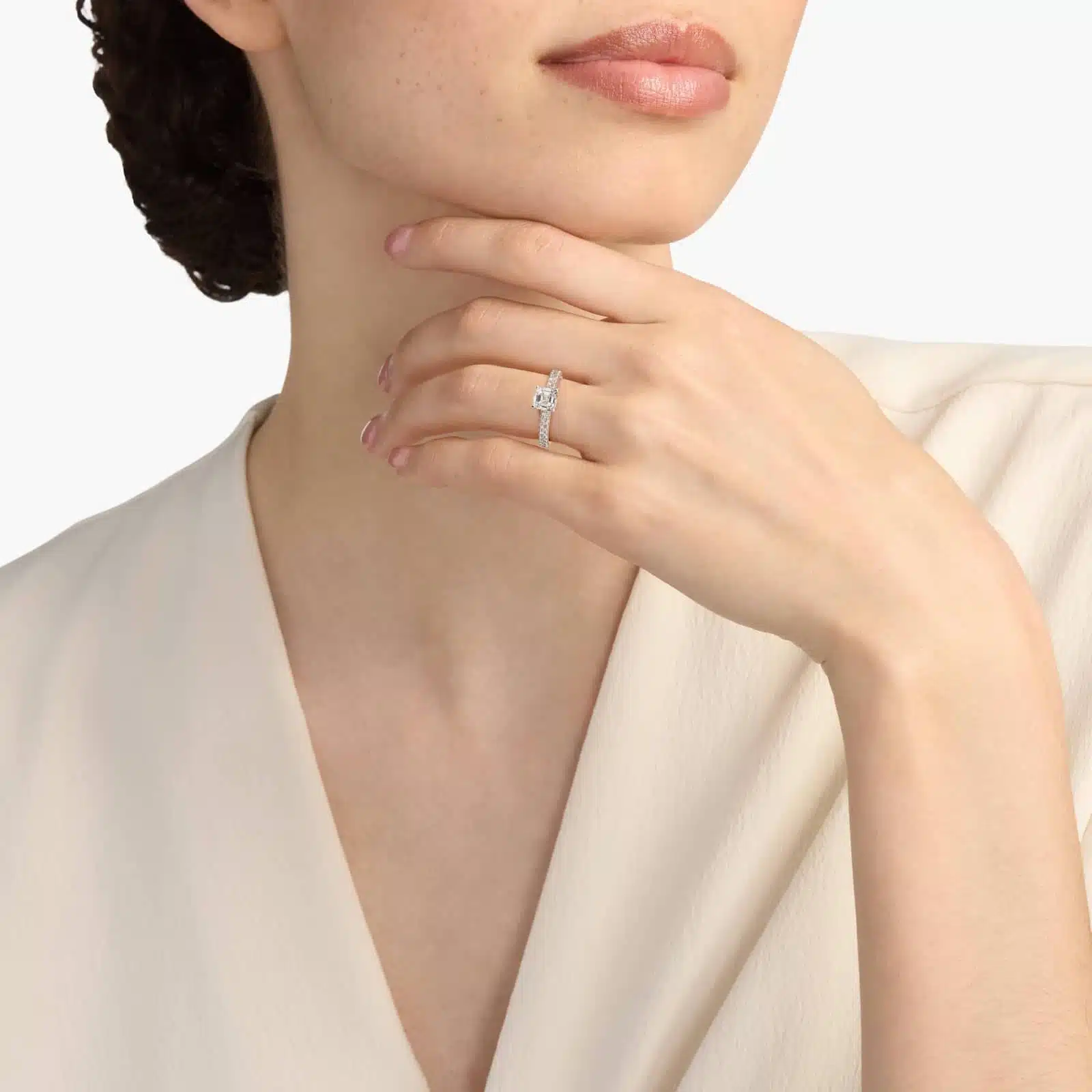 asscher kite with prongs on sides 3 Discover the elegant asscher kite with prongs on sides ring in 14K white gold, featuring 16 round diamonds in a stunning pave setting.