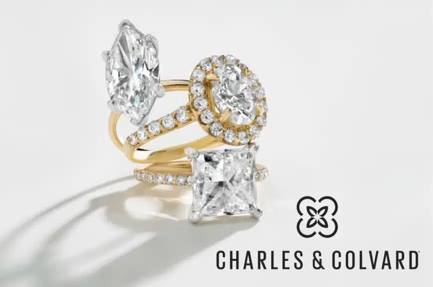 3 Charles & Colvard Ring in a asthetic white background with charles and colvard black logo 