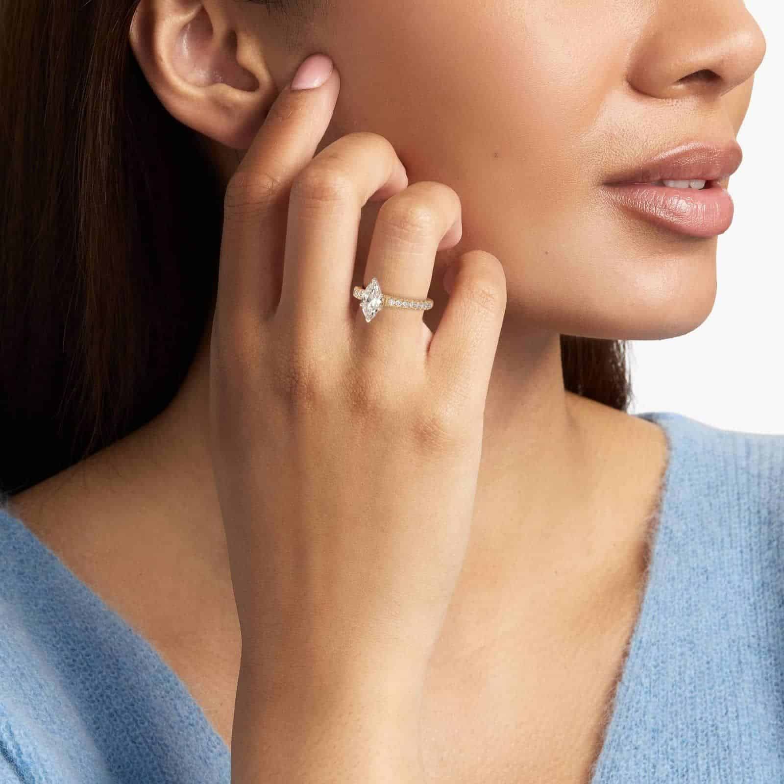 exact lab-grown diamond copy of Selena Gomez's engagement ring, featuring a stunning marquise-cut D color VVS2 stone set in 14K yellow gold from Blue Nile 3 exact lab-grown diamond copy of Selena Gomez's engagement ring, featuring a stunning marquise-cut D color VVS2 stone set in 14K yellow gold from Blue Nile