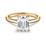 Certified 3 carat emerald cut moissanite ring in 10k gold from ISAAC WOLF. Perfect for engagement, wedding, or promise.