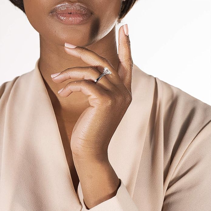 emerald-cut-moissanite-ring-6 6 Charles & Colvard emerald cut moissanite engagement ring in 14k white gold (3.55 cttw DEW). Lab-grown brilliance with a lifetime warranty.