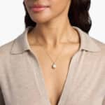 Oval Opal with Blue and White Topaz Halo Pendant in 14k Rose Gold