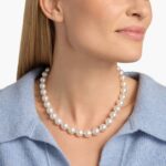 An exquisite 17-inch strand of exceptionally large and luminous South Sea cultured pearls, hand-knotted and secured with an 18k white gold safety clasp.