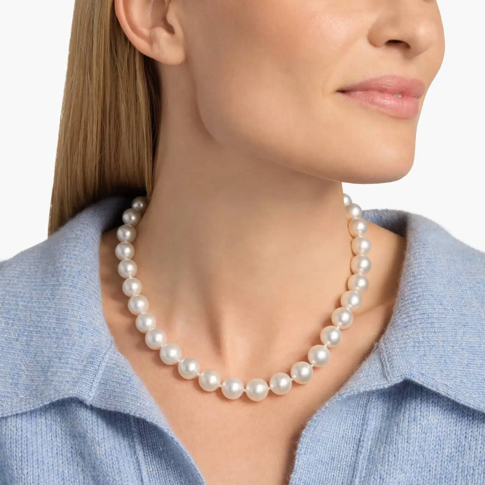An exquisite 17-inch strand of exceptionally large and luminous South Sea cultured pearls, hand-knotted and secured with an 18k white gold safety clasp.