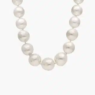 A magnificent 19-inch strand of exceptionally large (13-16.2mm), luminous white South Sea pearls, finished with a seamless 14k white gold hidden clasp.