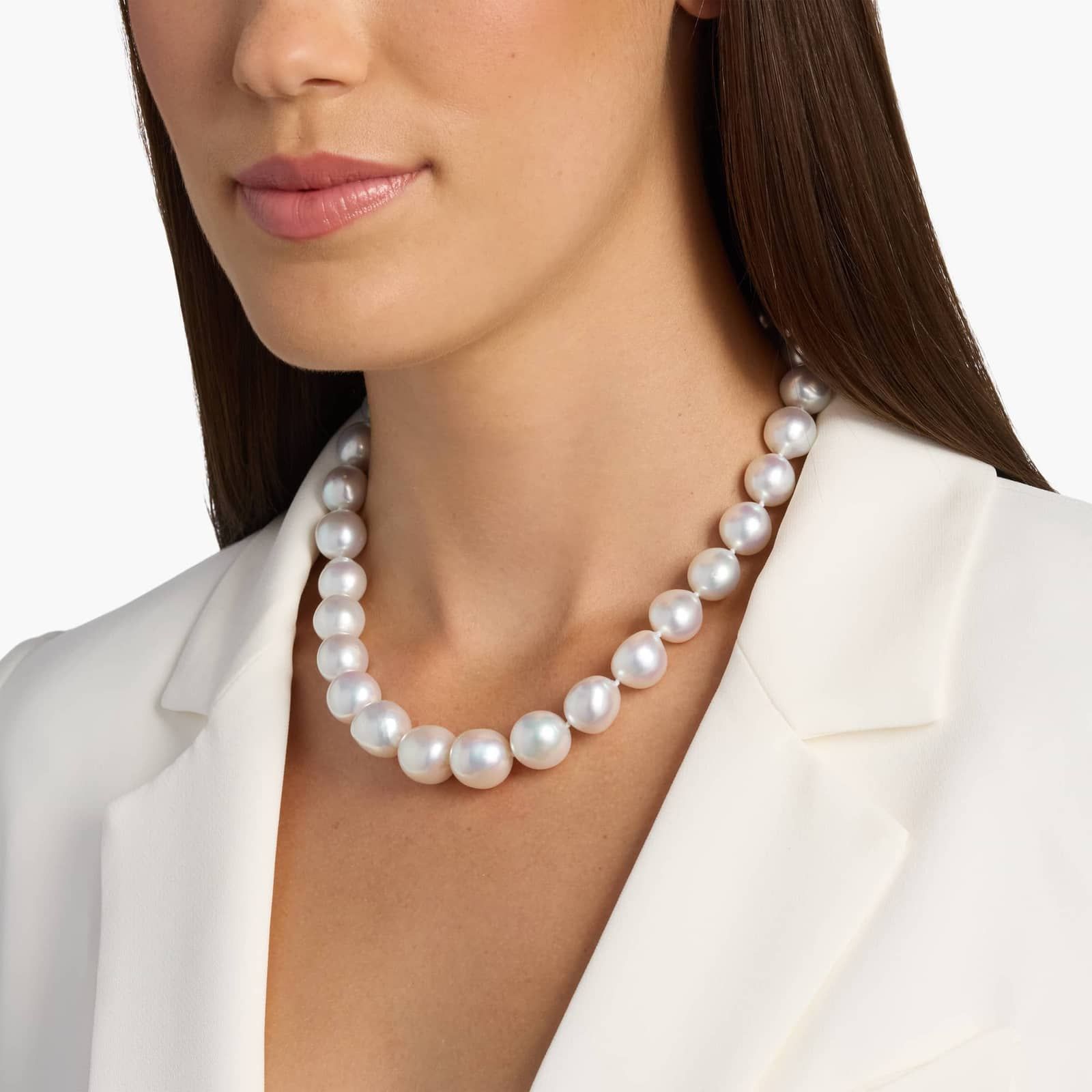 A magnificent 19-inch strand of exceptionally large (13-16.2mm), luminous white South Sea pearls, finished with a seamless 14k white gold hidden clasp.