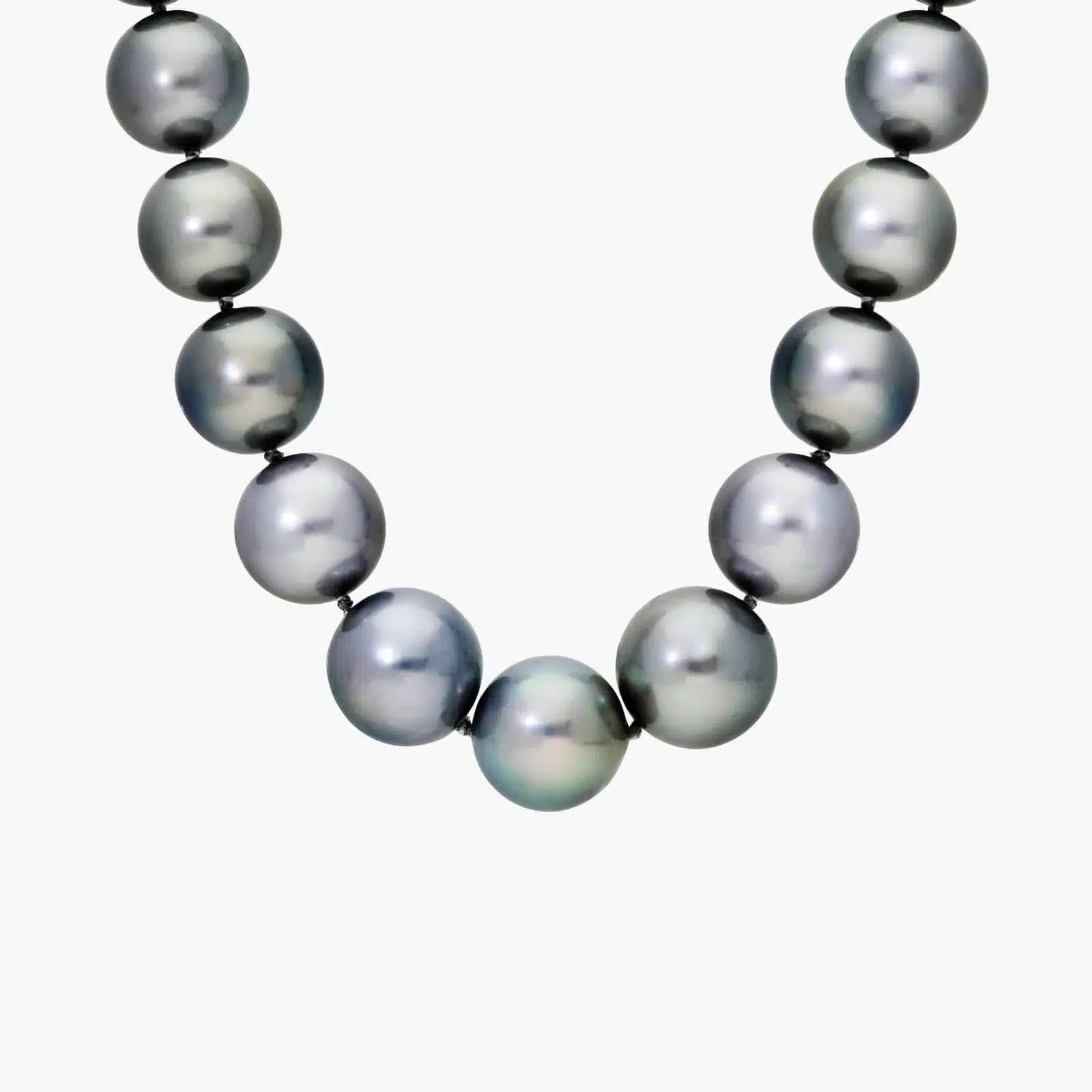 A magnificent 18-inch strand of exceptionally large (15-17mm) grey Tahitian pearls, secured with a solid 18k white gold and diamond clasp.