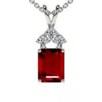 An exceptional AAAA heirloom-quality emerald-cut ruby, crowned by a trio of brilliant G-color diamonds and set in your choice of fine metal.