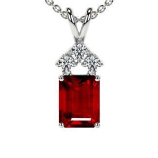 An exceptional AAAA heirloom-quality emerald-cut ruby, crowned by a trio of brilliant G-color diamonds and set in your choice of fine metal.