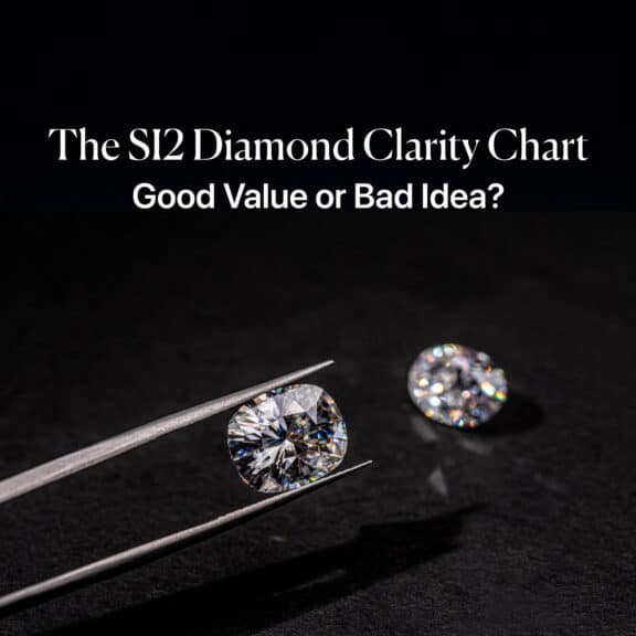 A cushion-cut SI2 diamond held in tweezers for inspection, illustrating the debate on the SI2 diamond clarity chart.
