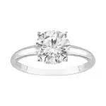 A classic 4-prong solitaire lab-grown diamond engagement ring, showcasing its IGI-certified round brilliant cut diamond in a 14k white gold setting on a plain background.