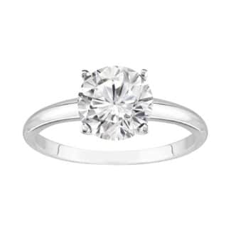 A classic 4-prong solitaire lab-grown diamond engagement ring, showcasing its IGI-certified round brilliant cut diamond in a 14k white gold setting on a plain background.
