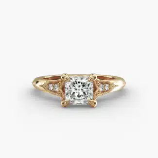 A macro shot of a GIA 3.03 carat princess diamond vintage-style ring on a white background, highlighting the intricate fleur-de-lis pavé details and the stunning clarity of the diamond.