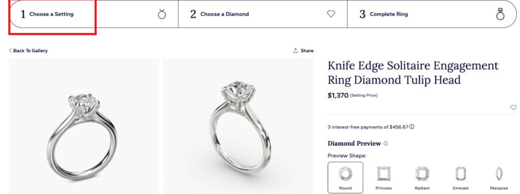 A screenshot showing Step 2, the Blue Nile setting gallery. The user is shown selecting the "Knife Edge Solitaire Engagement Ring," a classic and popular style, to begin building a custom ring with a round brilliant cut diamond.