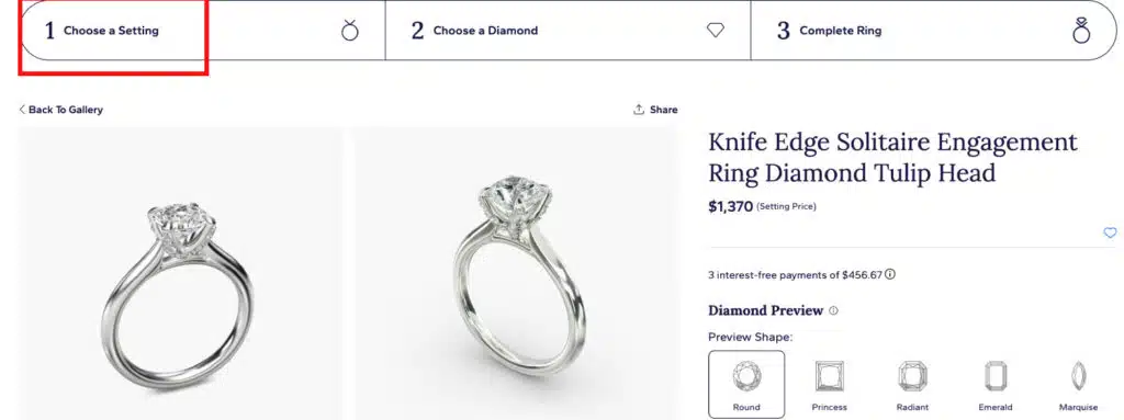 A screenshot showing Step 2, the Blue Nile setting gallery. The user is shown selecting the "Knife Edge Solitaire Engagement Ring," a classic and popular style, to begin building a custom ring with a round brilliant cut diamond.