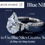 A feature image for a step-by-step guide on how to use Blue Nile's Creative Studio to build your own engagement ring. The image shows a beautiful engagement ring with a large pear cut diamond, half photorealistic and half a sketch, symbolizing the customization and design process. Annotations point to the key components of the ring: the brilliant "center stone," the metal "setting," and the delicate "hidden accents," illustrating the control you have when you design your own ring online.