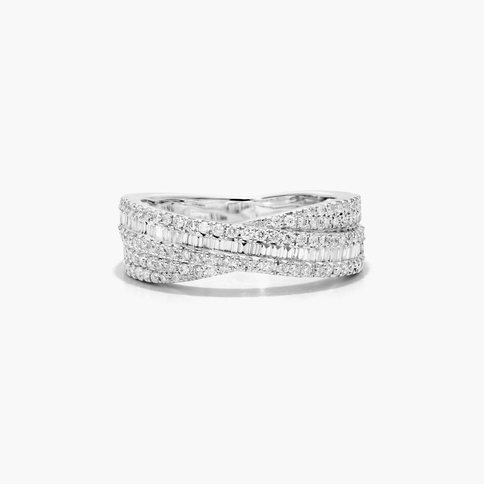 A wide crossover diamond ring in 14k white gold featuring interwoven bands of tension-set baguette diamonds and pavé-set round diamonds on a white background.