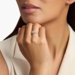 A model's hand wearing the brilliant 1-carat three-row diamond ring, showcasing its substantial width and sparkle as a right-hand statement piece.