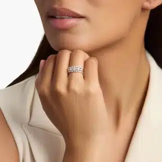A model's hand wearing the brilliant 1-carat three-row diamond ring, showcasing its substantial width and sparkle as a right-hand statement piece.