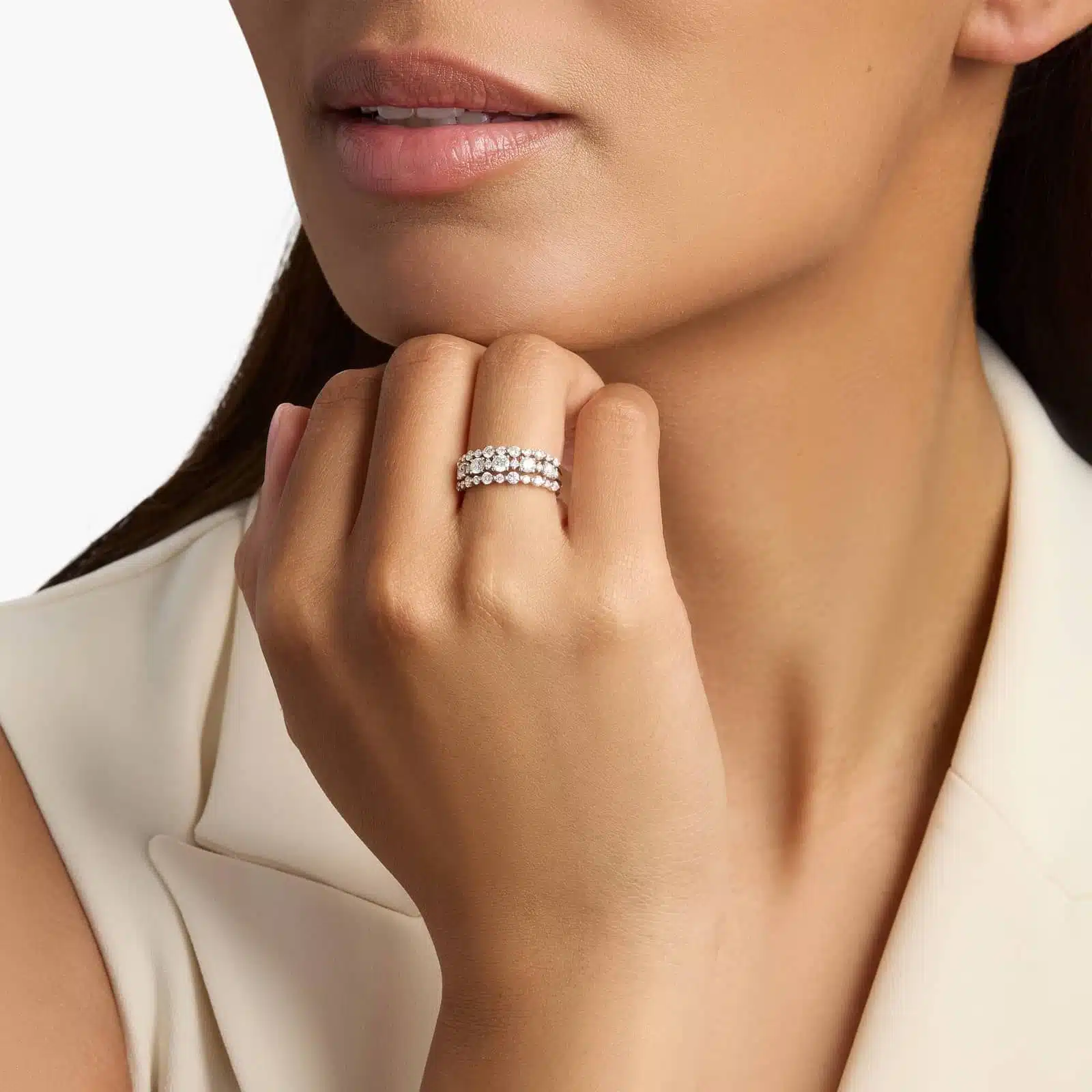 A model's hand wearing the brilliant 1-carat three-row diamond ring, showcasing its substantial width and sparkle as a right-hand statement piece.
