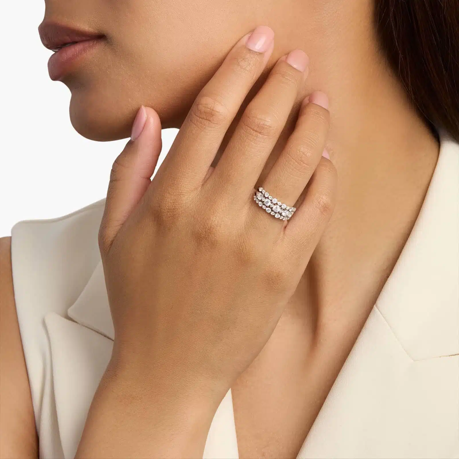 A model's hand wearing the brilliant 1-carat three-row diamond ring, showcasing its substantial width and sparkle as a right-hand statement piece.
