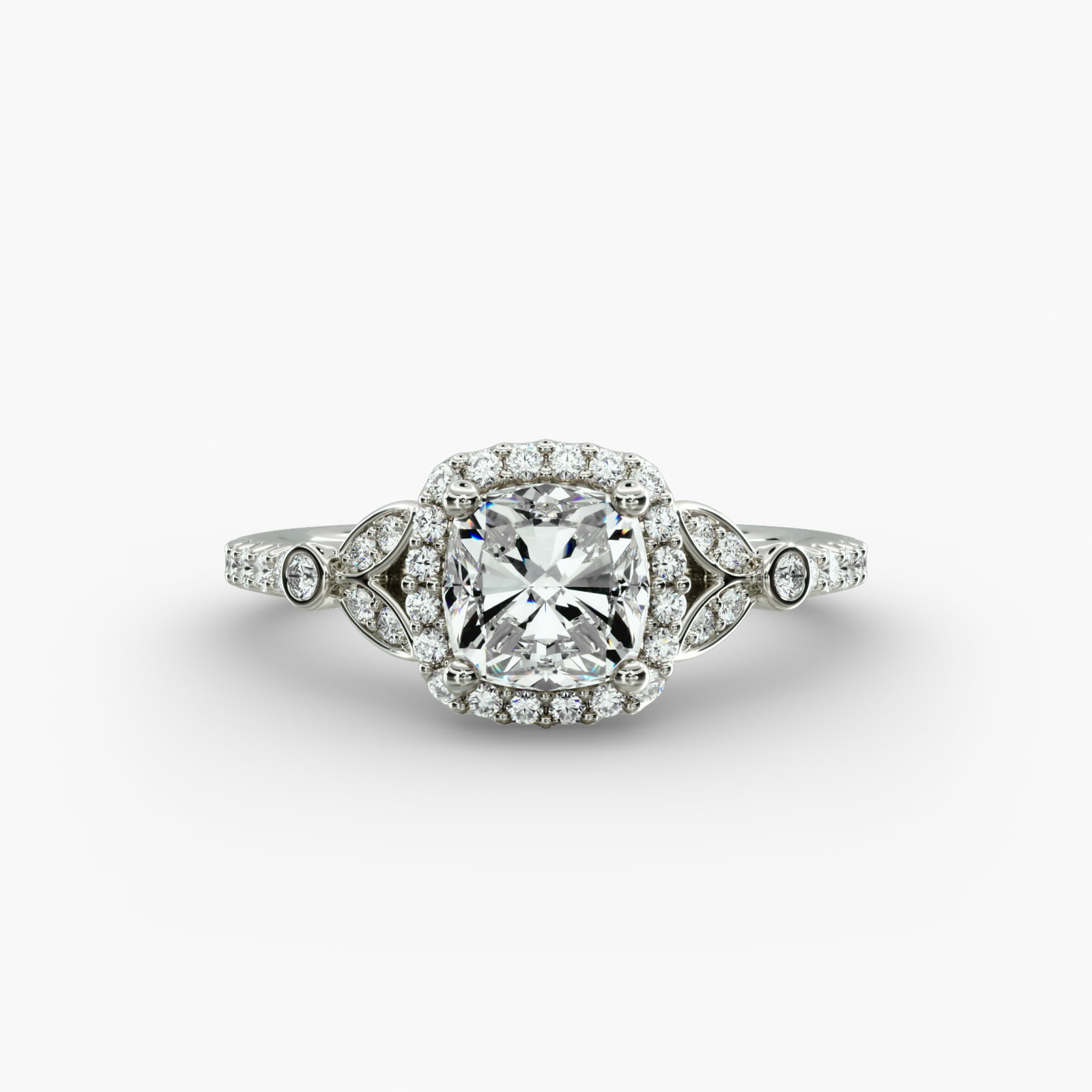 A high-resolution studio image of a GIA 1.50 carat cushion modified diamond engagement ring on a white background, highlighting the Ideal Cut and the intricate details of the halo and pavé setting.