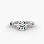 A detailed close-up of a GIA 1.53 carat round brilliant cut diamond ring on a white background, emphasizing the intricate design of the infinity band and the excellent cut of the center diamond.