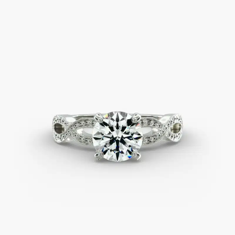 A detailed close-up of a GIA 1.53 carat round brilliant cut diamond ring on a white background, emphasizing the intricate design of the infinity band and the excellent cut of the center diamond.