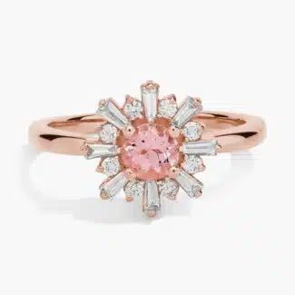 A close-up studio shot of a **morganite and baguette diamond halo ring** on a white background, highlighting the contrast between the round center stone and the linear baguette-cut diamonds.