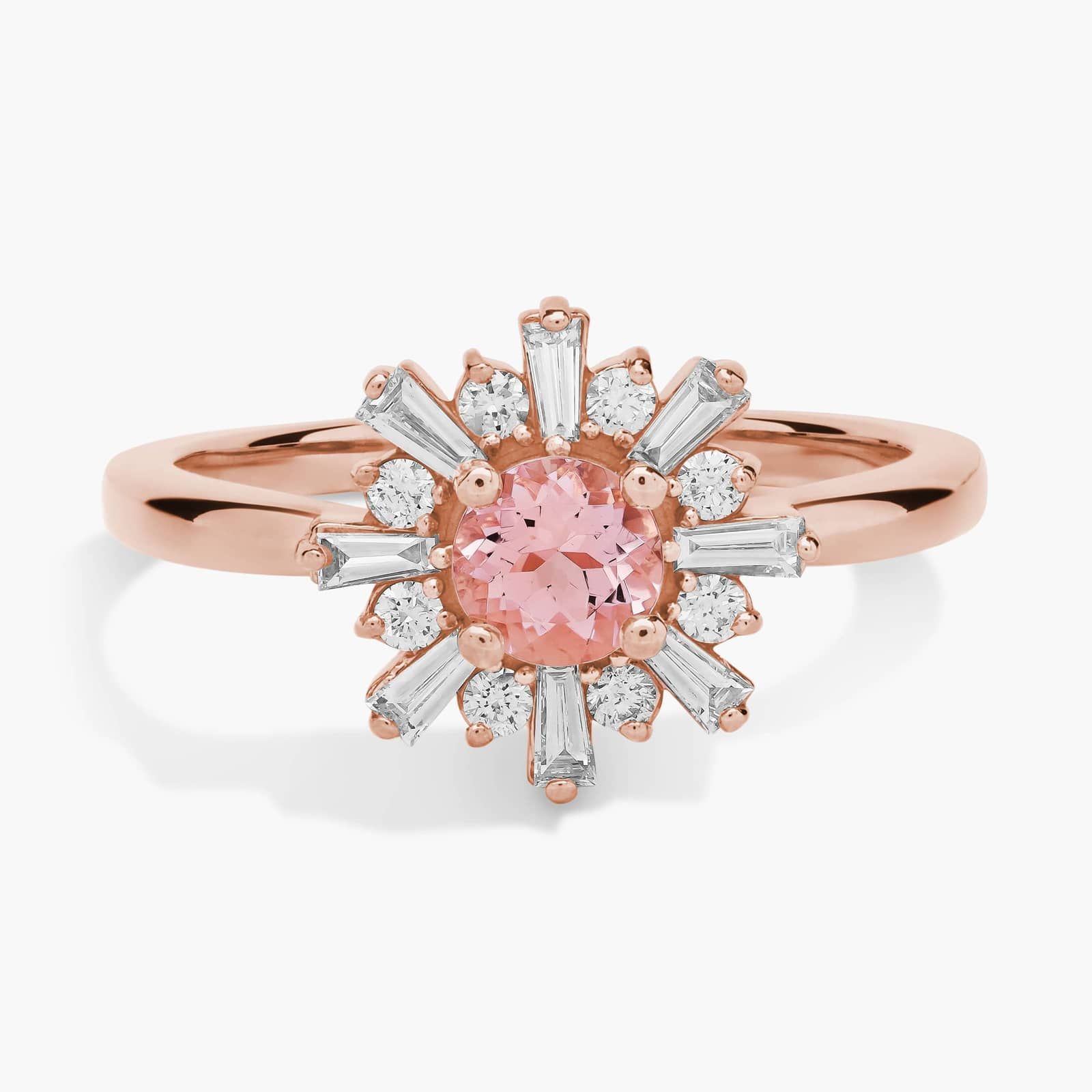 A close-up studio shot of a **morganite and baguette diamond halo ring** on a white background, highlighting the contrast between the round center stone and the linear baguette-cut diamonds.
