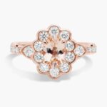 A close-up studio shot of a **Morganite Floral Engagement Ring** on a white background, highlighting the unique floral halo design and the brilliant sparkle of the diamonds.