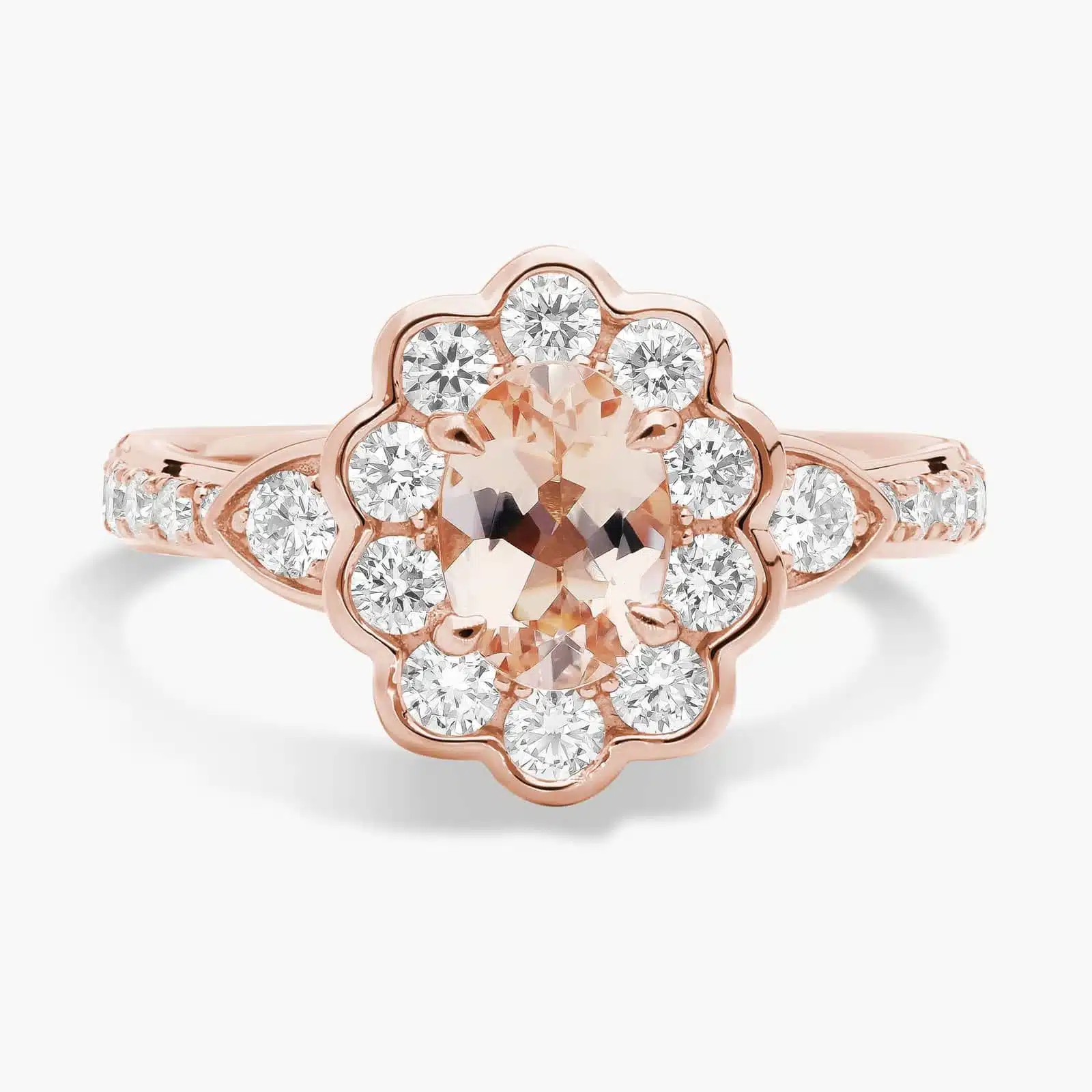 A close-up studio shot of a **Morganite Floral Engagement Ring** on a white background, highlighting the unique floral halo design and the brilliant sparkle of the diamonds.