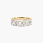 A seven stone emerald cut lab diamond anniversary ring with 2 ctw of stones set in a 14k yellow gold shared prong band, shown on a white background.