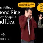 A humorous featured image for an article titled "Why Selling a Diamond Ring at a Pawn Shop is a Bad Idea." The image depicts a man and a woman in a comical argument against a black background. The woman on the right is yelling with her hands up in exasperation, with a yellow speech bubble that says, "Why did you sell the diamond to a pawn shop?" The man on the left is grimacing and covering his ears, with a yellow speech bubble that says, "It's not my fault, my Grandma asked me to do this!" This funny visual is designed to grab the reader's attention and highlight the common regret associated with selling jewelry to a pawn shop. It illustrates the negative consequences of getting a poor pawn shop valuation for a valuable diamond ring, setting a humorous yet cautionary tone for the expert guide that follows.