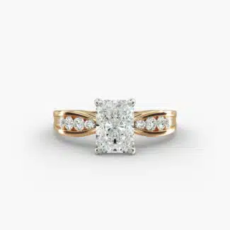 A close-up view of a 2.5 carat radiant cut diamond ring in 14k yellow gold, highlighting the channel-set diamonds.
