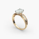 A close-up side view of a 2.5 carat radiant cut diamond ring in 14k yellow gold, highlighting the channel-set diamonds.