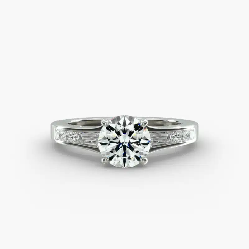 A close-up studio shot of a **Hearts and Arrows Diamond Engagement Ring**, highlighting the precise cut of the main diamond and the sleek, geometric lines of the tapered baguette side diamonds in a platinum setting.