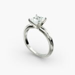 A close-up side view of a simple solitaire 2 carat princess cut lab-grown diamond engagement ring, highlighting the stone's setting in 14k white gold.