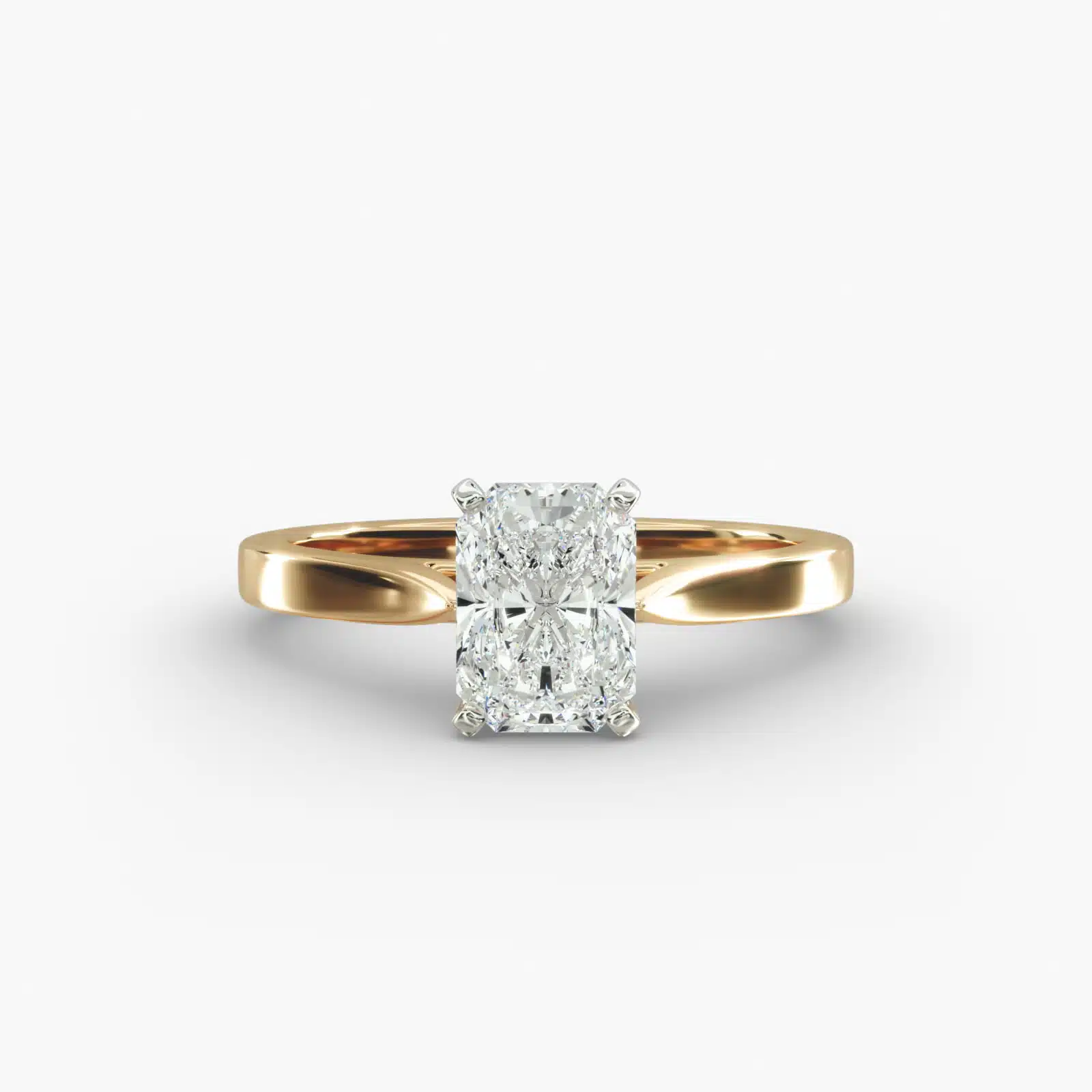 A close-up side view of a 3 ct radiant cut diamond ring, highlighting the Petite Cathedral setting and the elongated shape.