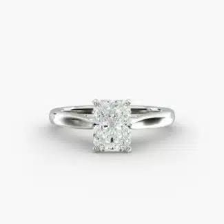 A close-up side view of a 4 carat radiant cut diamond ring, highlighting the secure prongs and the tapered 14k white gold band.