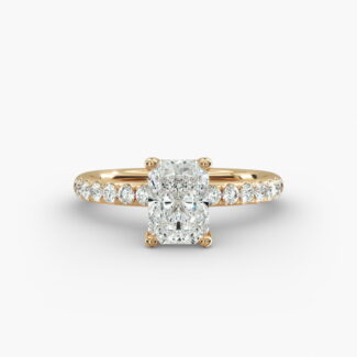A close-up side view of a 3ct radiant cut diamond ring, showcasing the narrow 1.80mm yellow gold band and the subtle micropavé sparkle.
