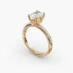 A close-up side view of a 3ct radiant cut diamond ring, showcasing the narrow 1.80mm yellow gold band and the subtle micropavé sparkle.