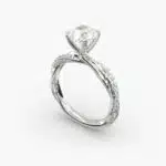 A close-up side view of a 2 carat radiant cut diamond ring, highlighting the G-VS1 clarity of the center stone and the detailed Pavé Rope setting.